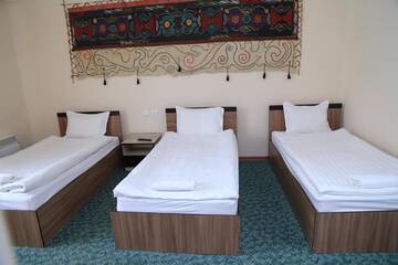 Фото номера Семейный номер с душем Отель Khan Tengri Hotel г. Naryn 5