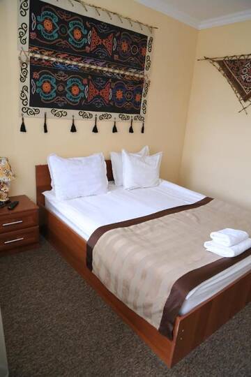 Фото номера Двухместный номер с 1 кроватью Отель Khan Tengri Hotel г. Naryn 3