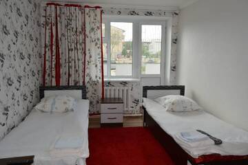 Фото номера Двухместный номер с 2 отдельными кроватями Гостевой дом Dasha Guest House г. Naryn 4
